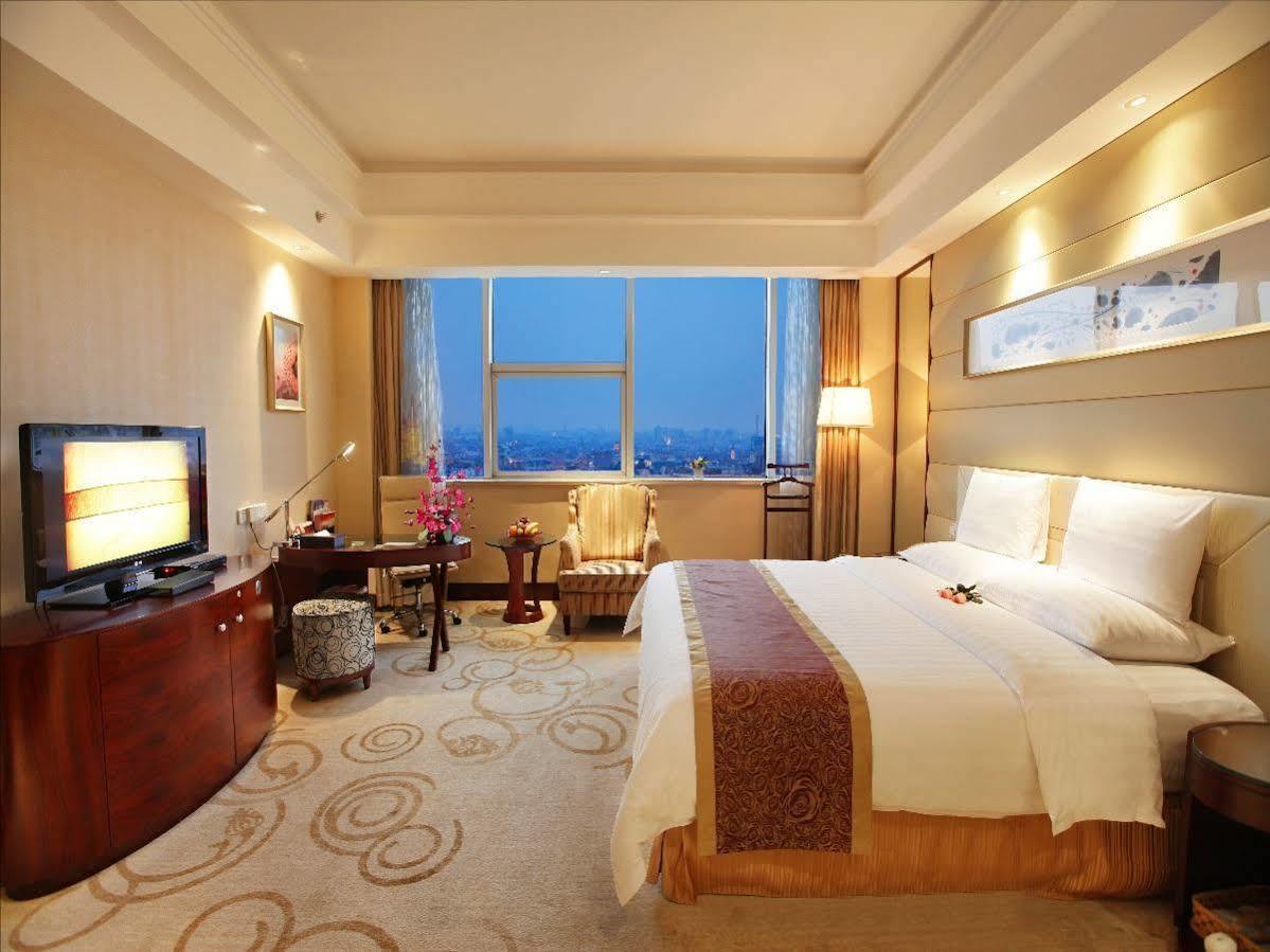 Golden Shining New Century Grand Hotel Beihai Extérieur photo